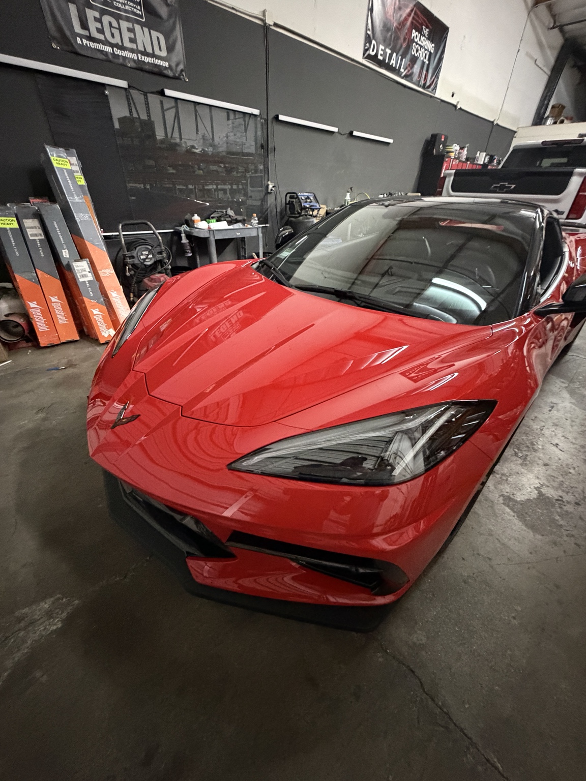 Red Corvette after paint protection film installation